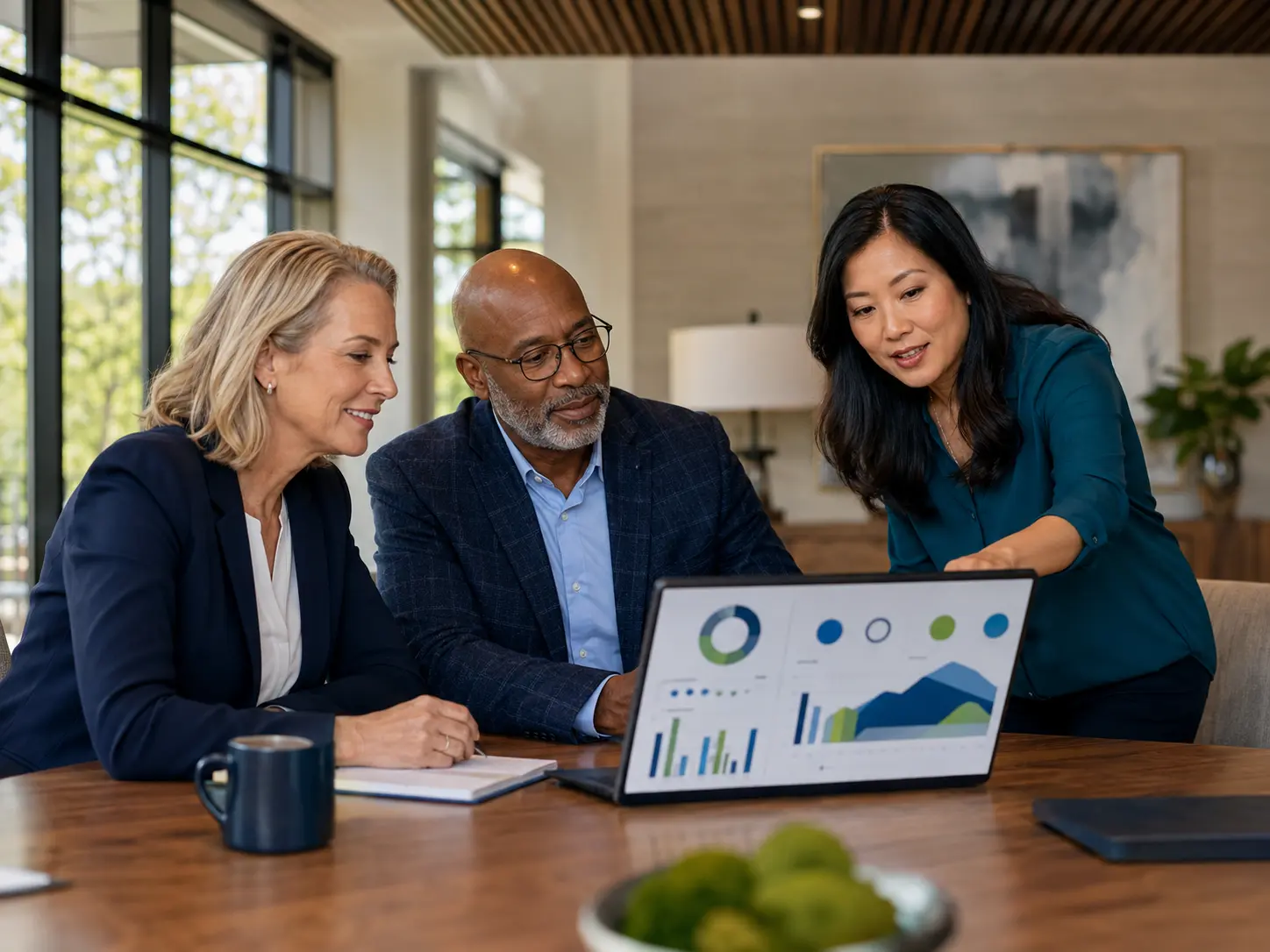 Senior-living executives reviewing portfolio performance together